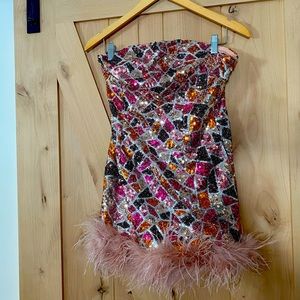 La Ros sequin dress with feather trim. New with tags. Size Large